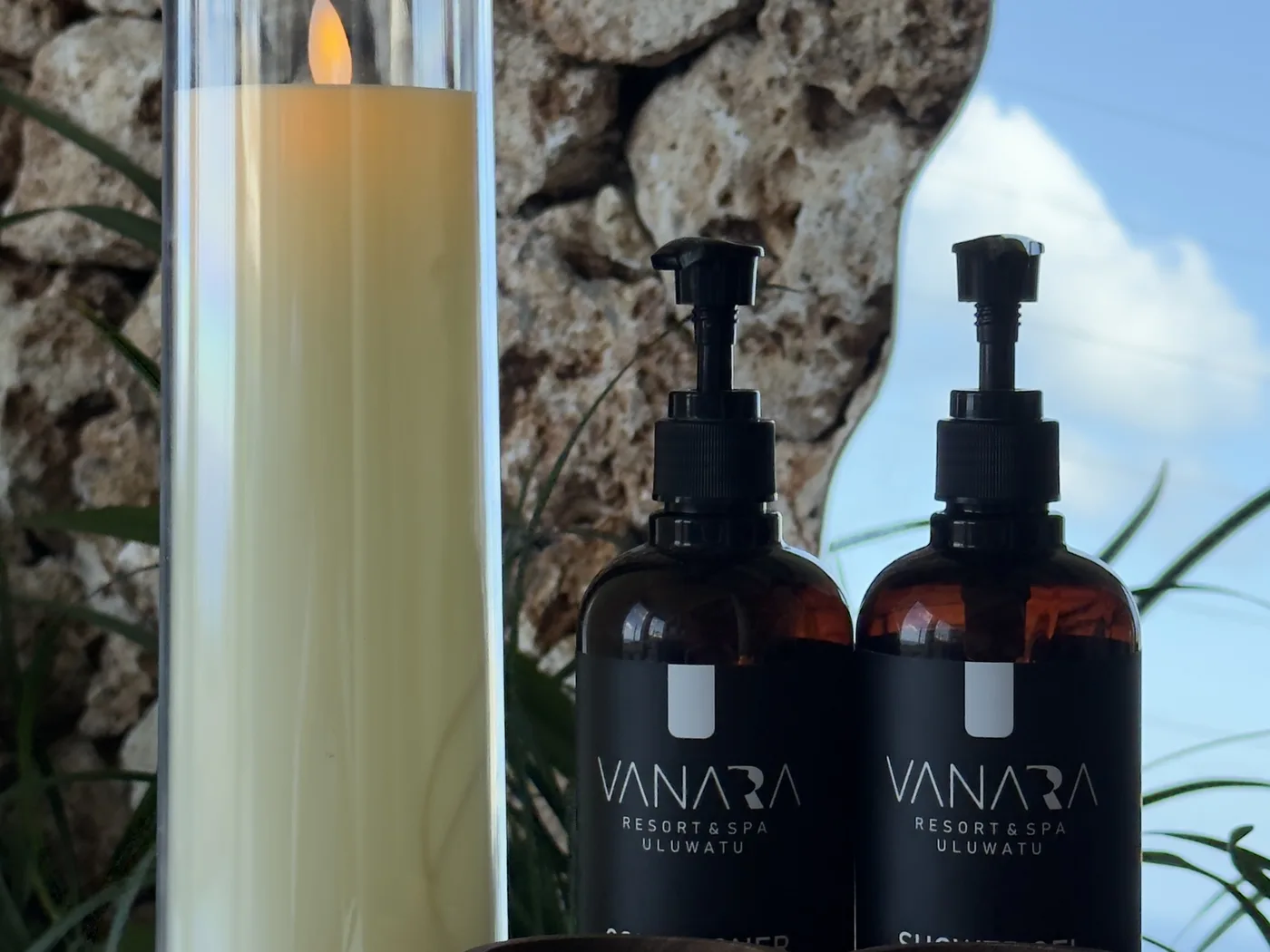 VANARA massage oils, candle and flower petals prepared for a spa treatment in Uluwatu